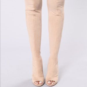 Thigh high heels, never worn.